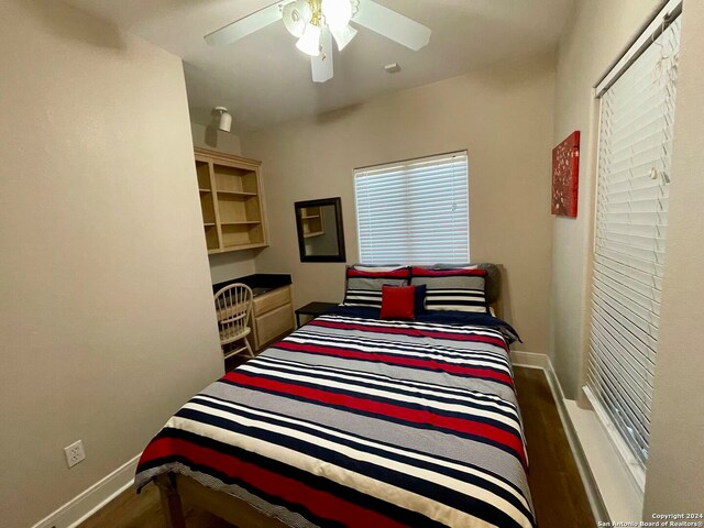 54 Pelican Prt, Oconnor, TX 77982 - bedroom with dark hardwood / wood-style floors and ceiling fan