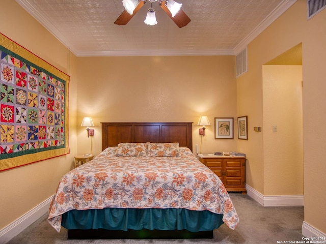 bedroom with crown molding, a textured ceiling, ceiling fan, and carpet flooring