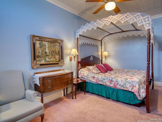 bedroom with ornamental molding, carpet flooring, and ceiling fan