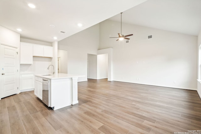 kitchen featuring white cabinetry, dishwasher, ceiling fan, sink, and a kitchen island with sink