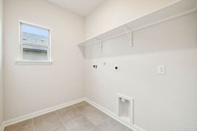 clothes washing area featuring washer hookup, gas dryer hookup, and electric dryer hookup