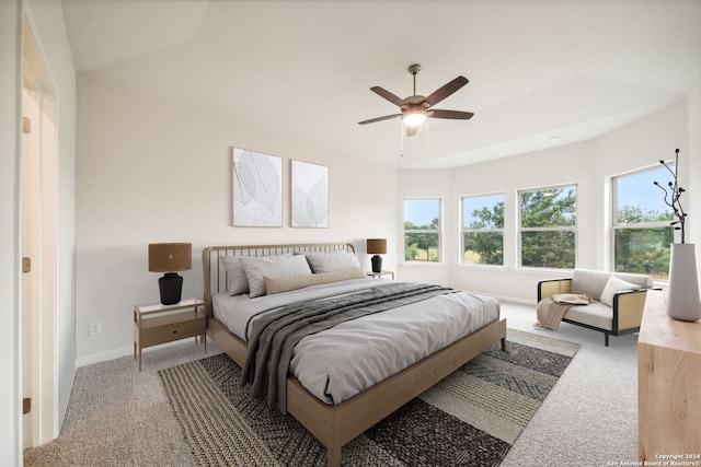 bedroom featuring ceiling fan and carpet