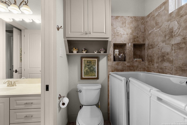 full bathroom with toilet, vanity, and washtub / shower combination