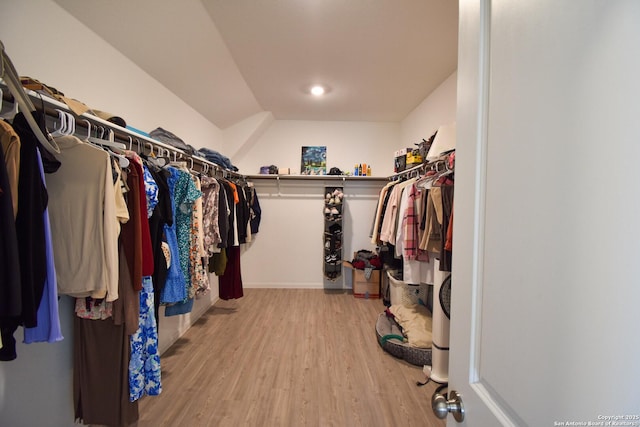 spacious closet with light wood-style flooring