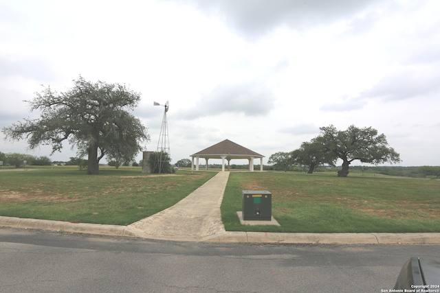 view of home's community featuring a lawn and a gazebo