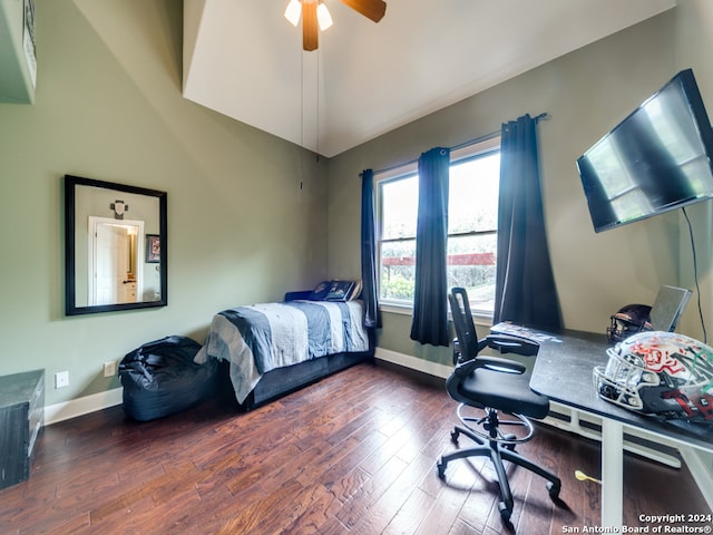 bedroom featuring ceiling fan and dark wood-type flooring