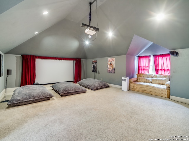 bedroom with carpet and vaulted ceiling