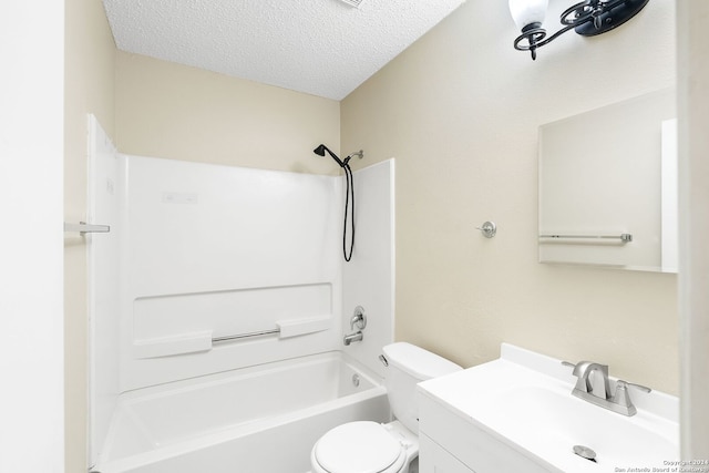 full bathroom with shower / bathtub combination, vanity, toilet, and a textured ceiling