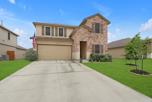 view of front of home featuring central AC unit, a front lawn, and a garage