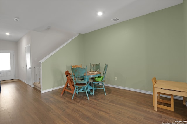 dining room with dark wood-type flooring