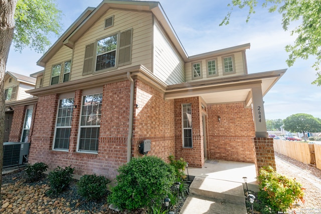 view of front of house with central AC unit