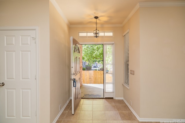 tiled foyer with crown molding