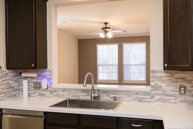 kitchen with dark brown cabinetry, sink, tasteful backsplash, and stainless steel dishwasher