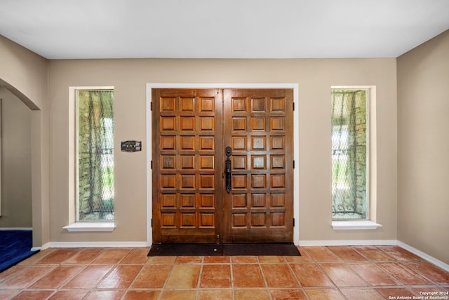 entrance foyer with tile patterned floors