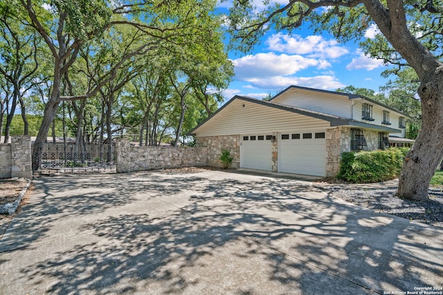 view of property exterior with a garage