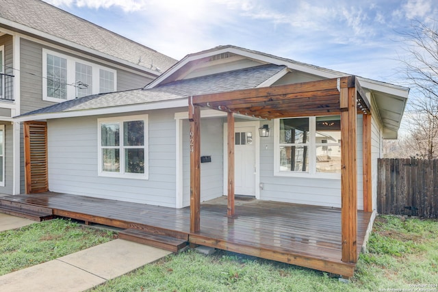 view of front of house with a deck