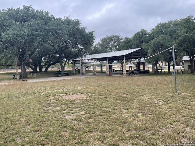 view of home's community featuring a lawn