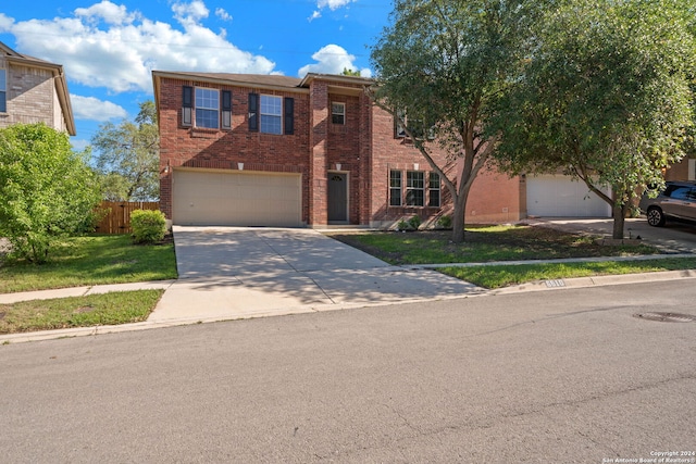 townhome / multi-family property featuring a garage