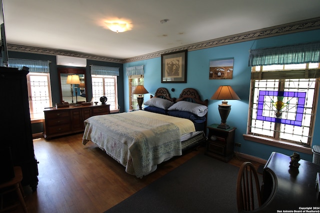 bedroom featuring dark hardwood / wood-style flooring