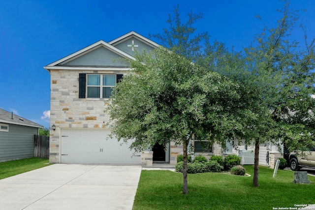 view of front facade featuring a front lawn and a garage