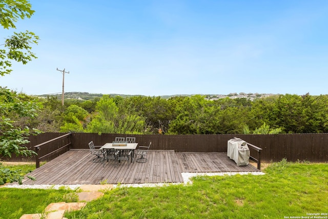 deck featuring a yard