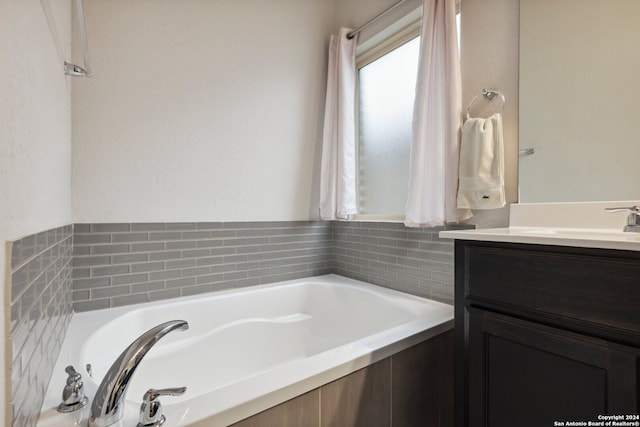 bathroom featuring a bathtub and vanity