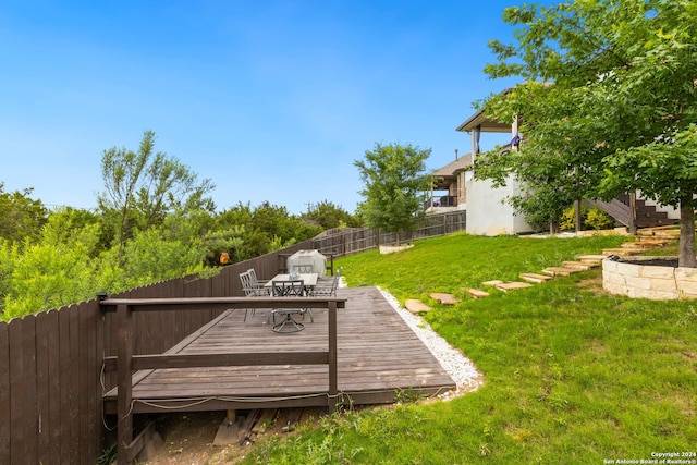 view of yard with a deck