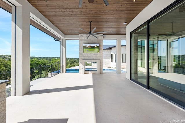 view of patio / terrace featuring ceiling fan