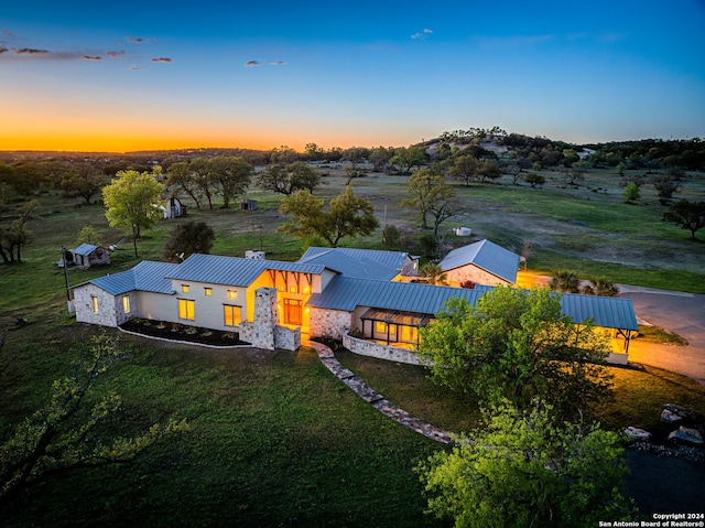 view of aerial view at dusk