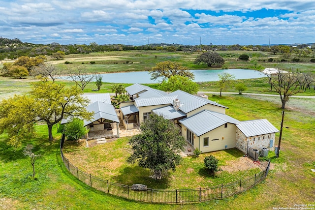 aerial view featuring a rural view and a water view