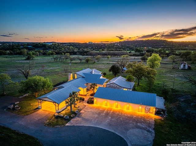 aerial view at dusk with a rural view