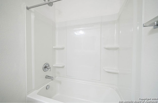 bathroom featuring shower / washtub combination