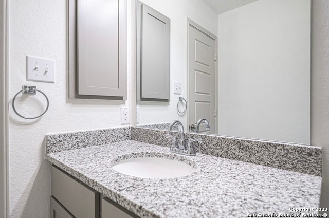 bathroom with oversized vanity