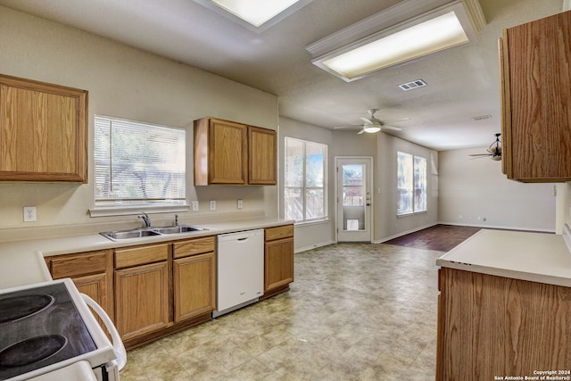 kitchen featuring range, light tile flooring, sink, dishwasher, and ceiling fan