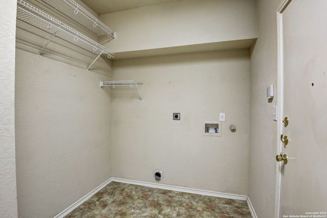 clothes washing area with gas dryer hookup, tile floors, washer hookup, and electric dryer hookup