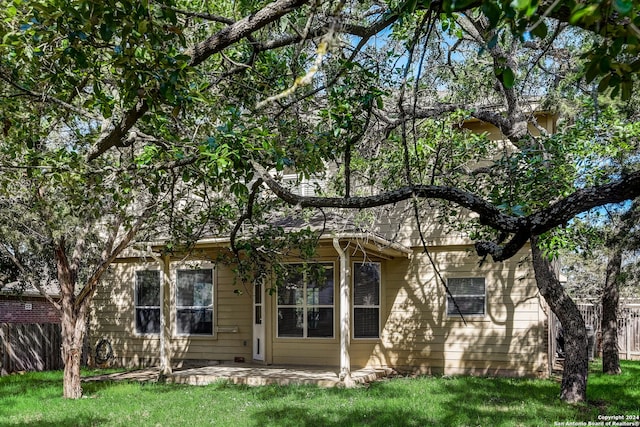 exterior space featuring a front lawn