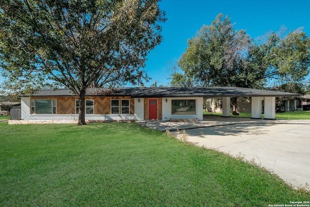 ranch-style house with a front lawn