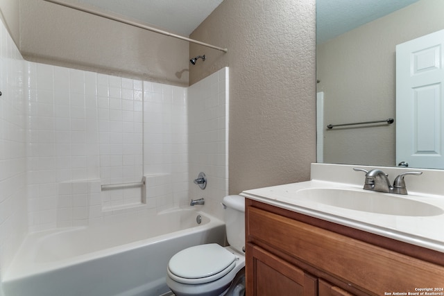 full bathroom with toilet, bathtub / shower combination, vanity, and a textured ceiling