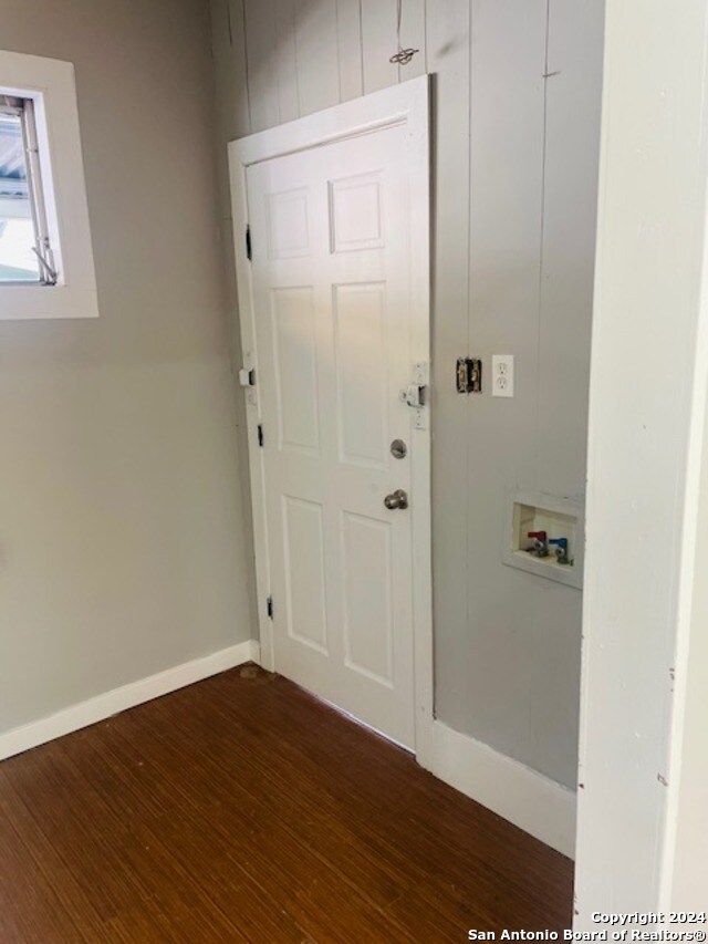 interior space with dark wood-type flooring