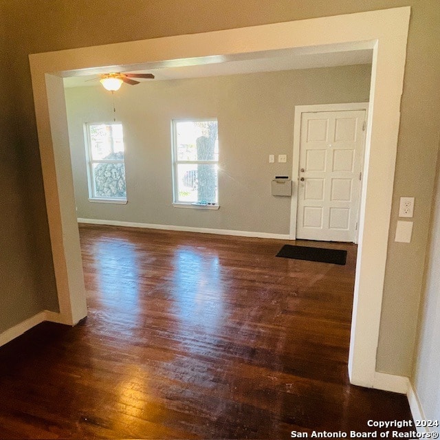 entrance foyer featuring ceiling fan and dark hardwood / wood-style flooring