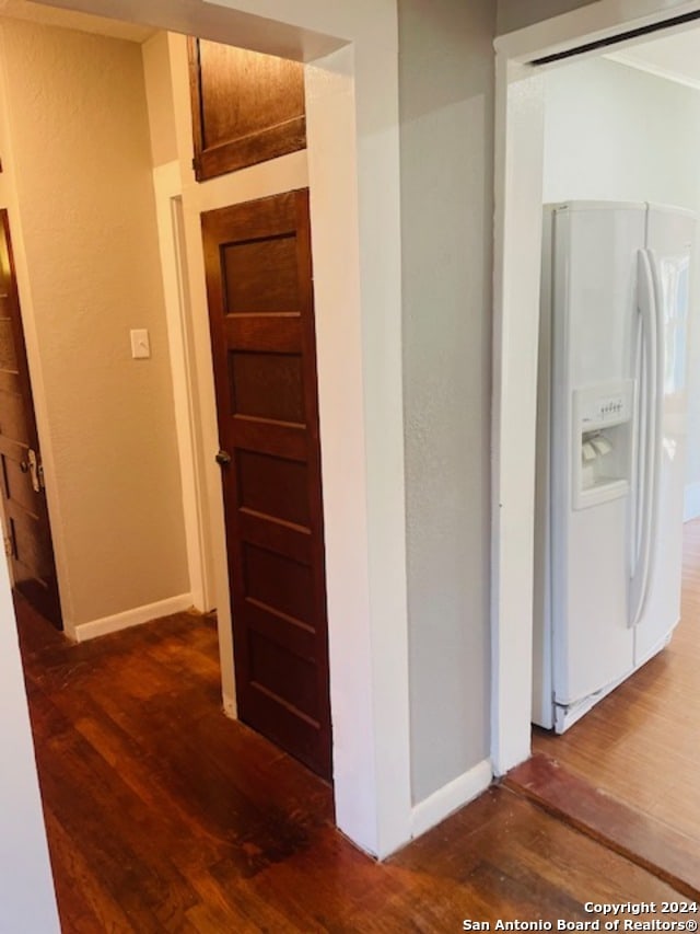 hall featuring dark hardwood / wood-style floors