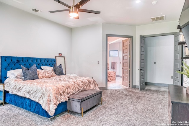 bedroom featuring light colored carpet and ceiling fan