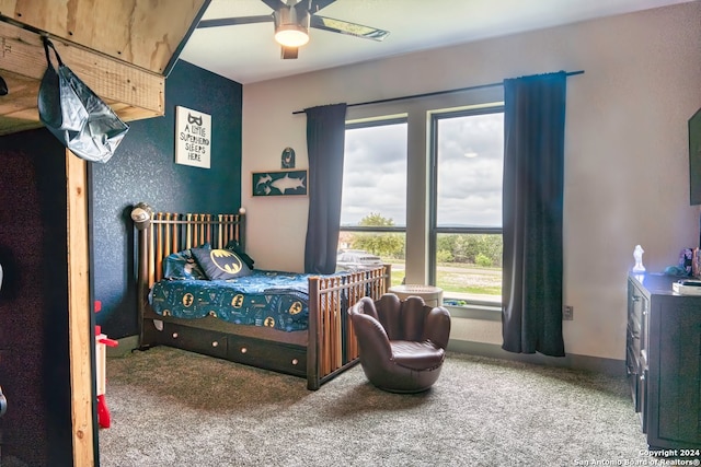 carpeted bedroom with ceiling fan