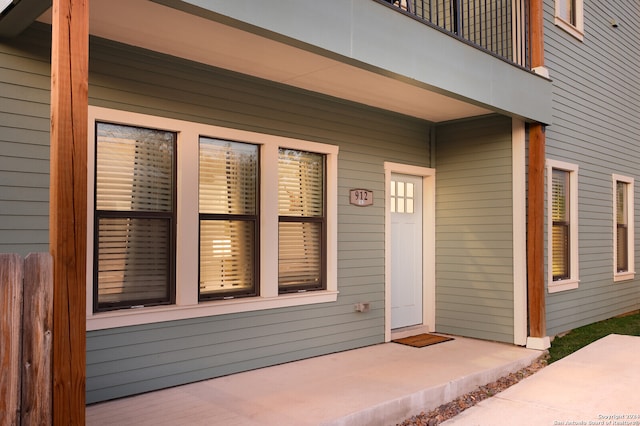 entrance to property with a balcony