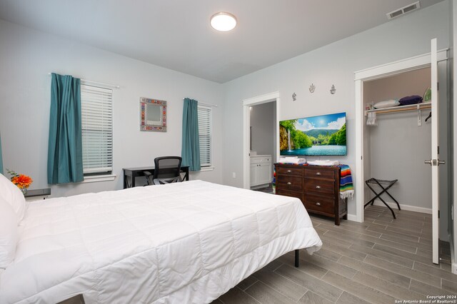 bedroom featuring hardwood / wood-style flooring