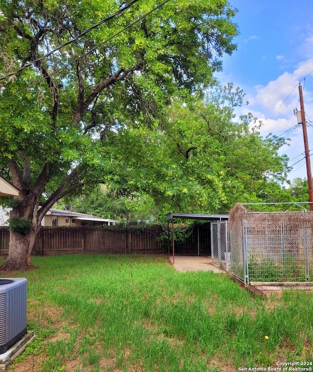 view of yard featuring central AC unit