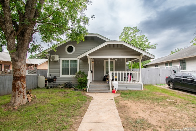 bungalow-style house featuring covered porch