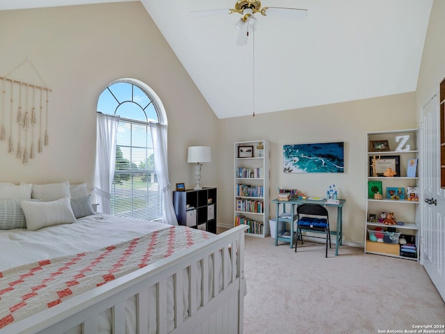 bedroom with light carpet, ceiling fan, and high vaulted ceiling