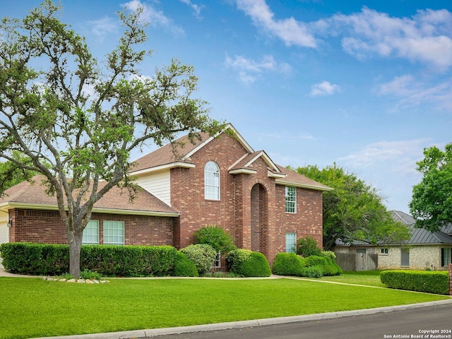 front of property featuring a front yard