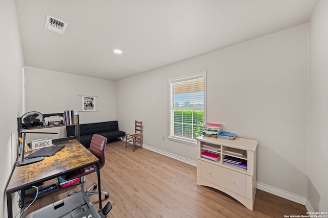 home office featuring light hardwood / wood-style floors